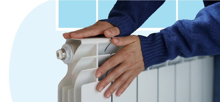 woman-warming-hands-on-natural-gas-heater