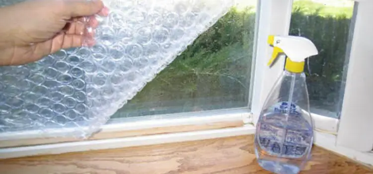 A layer of bubble wrap placed against a window to act as insulation