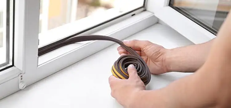 house installing weather stripping on window