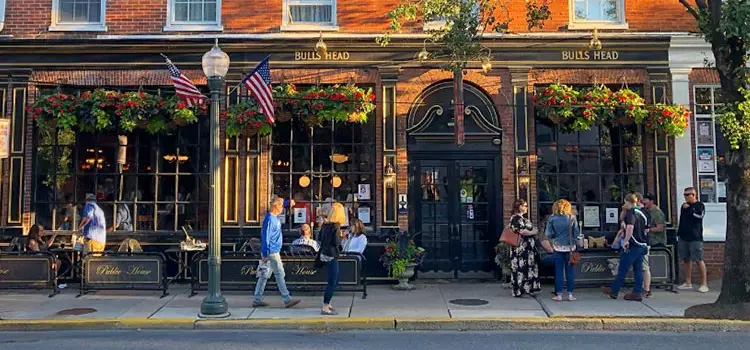 people walking past stores in downtown lititz pa