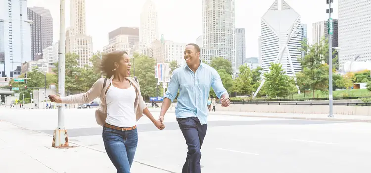 happy couple strolling in chicago