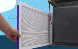 man-replacing-furnace-filter