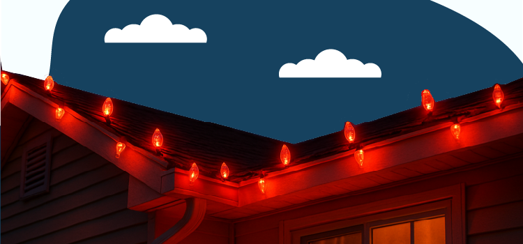 red-christmas-lights-on-the-roof-of-a-home