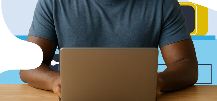 man in his kitchen looking at a computer man-in-his-kitchen-looking-at-a-computer