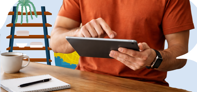 man-looking-at-a-tablet-in-his-living-room