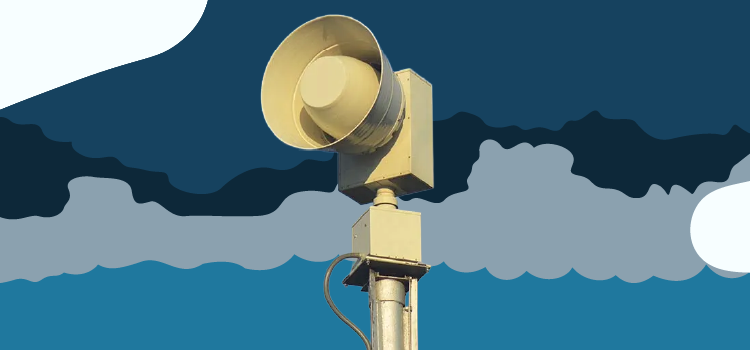 tornado siren against a stormy sky