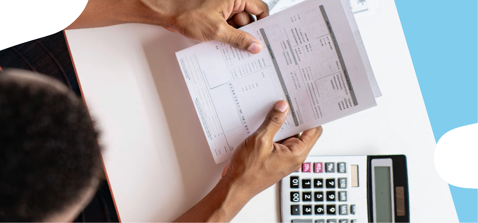 man looking of their energy bill in their home man-looking-of-their-energy-bill-in-their-home
