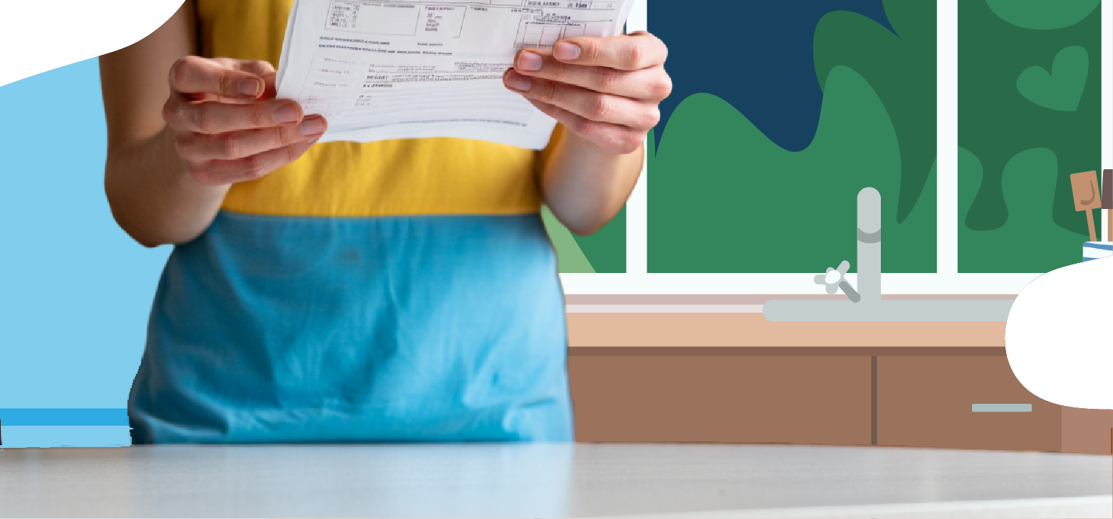 woman looking at her electricity bill in a kitchen woman-looking-at-her-electricity-bill-in-a-kitchen