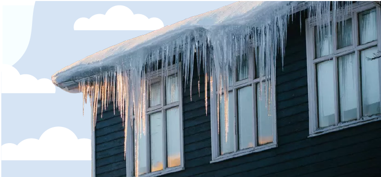 house with icicles on the roof in the winter house-with-icicles-on-the-roof-in-the-winter.