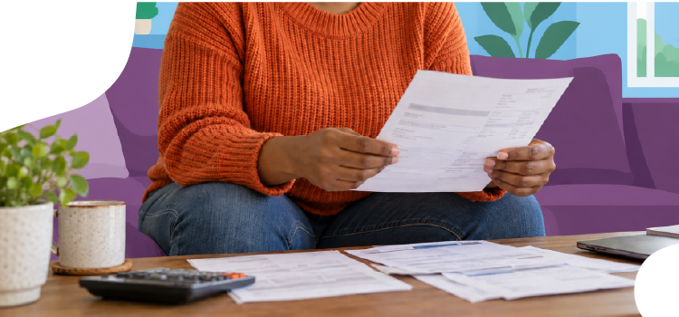 woman in an orange sweater sitting on a couch looking over her electricity bill woman-in-an-orange-sweater-sitting-on-a-couch-looking-over-her-electricity-bill
